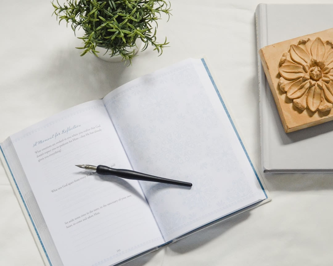 a pair of scissors and a notebook on Inner Progress Project